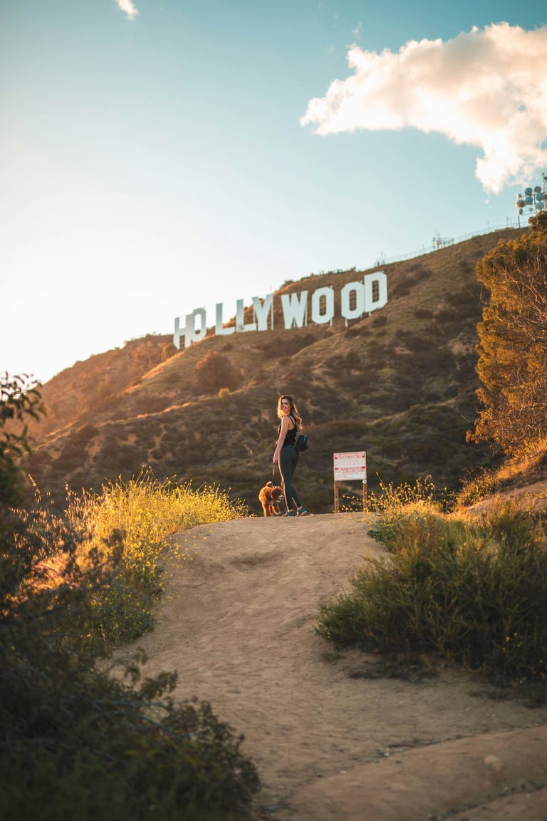 woman-with-dog-hollywood-sign-hike