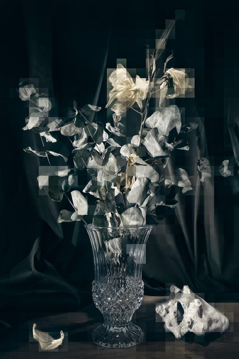 a vase with flowers in a vase on a table
