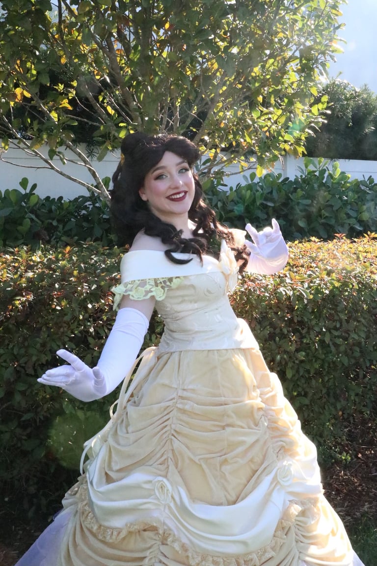 a woman in a beauty and the beast dress 