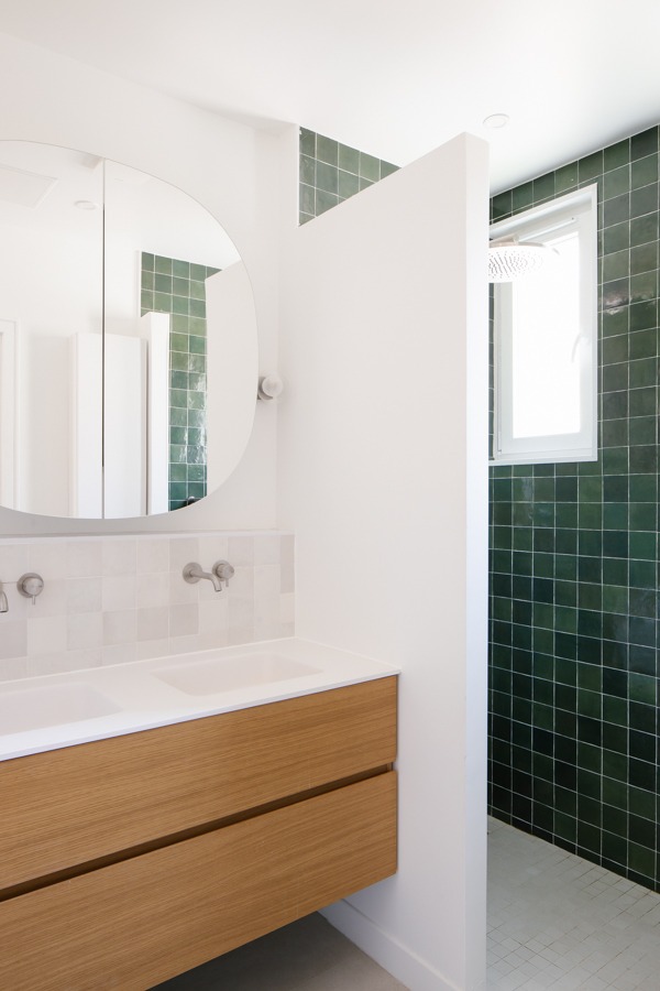 a bathroom with a mirror and a mirror