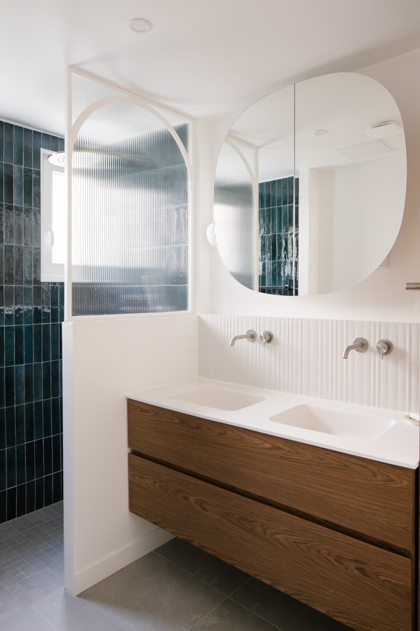 a hallway with a large window and a door