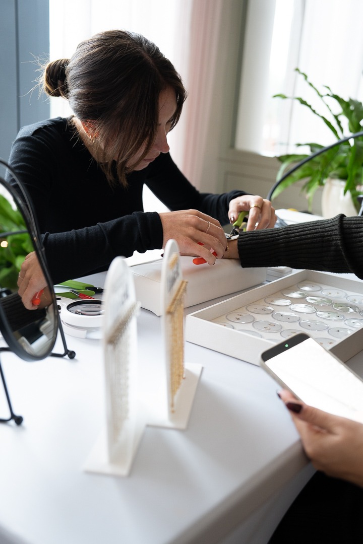 Hands styling products for a brand photoshoot in Brighton and Hove