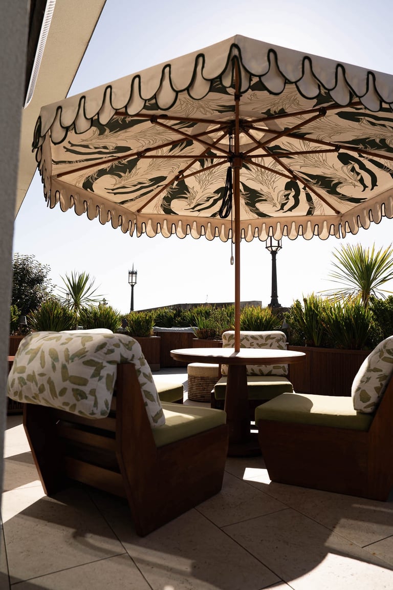 chairs and umbrella on the terrace during sunny day