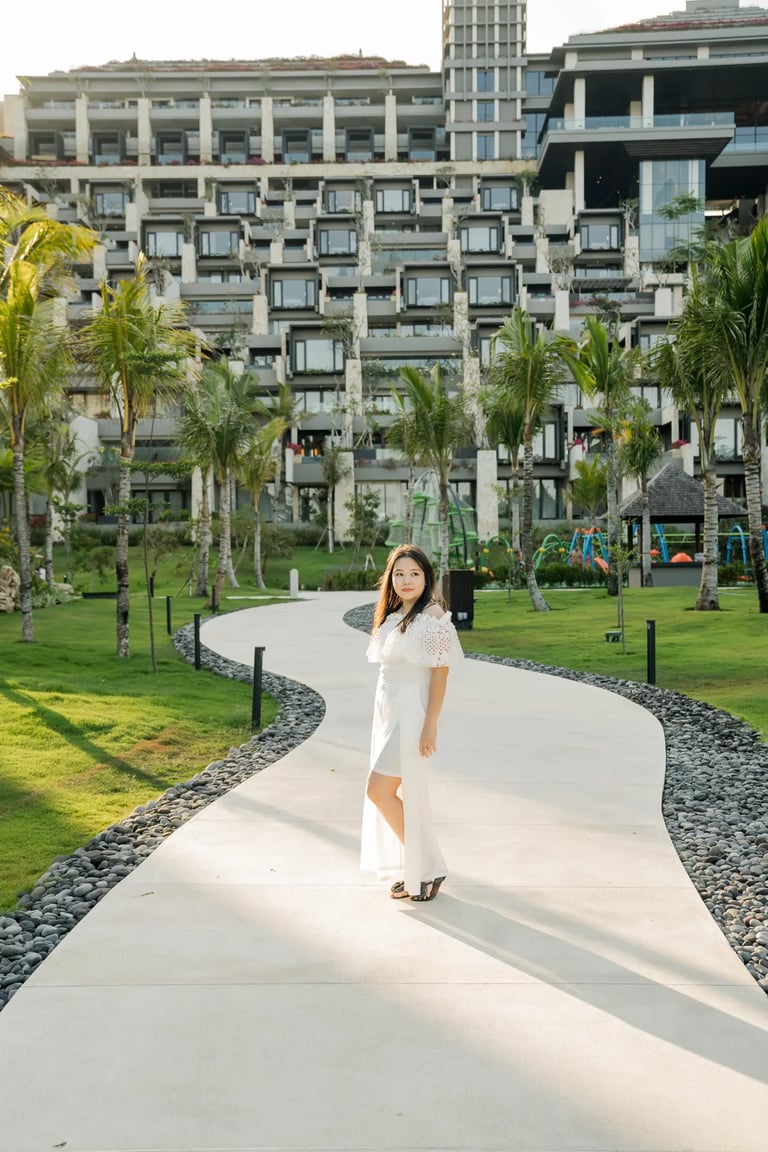 Portrait session on the peaceful garden pathways at The Apurva Kempinski Bali