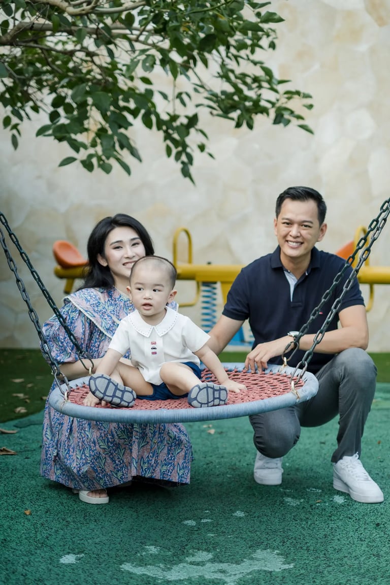 Family photography session at the children's playground of The Apurva Kempinski Bali in Nusa Dua