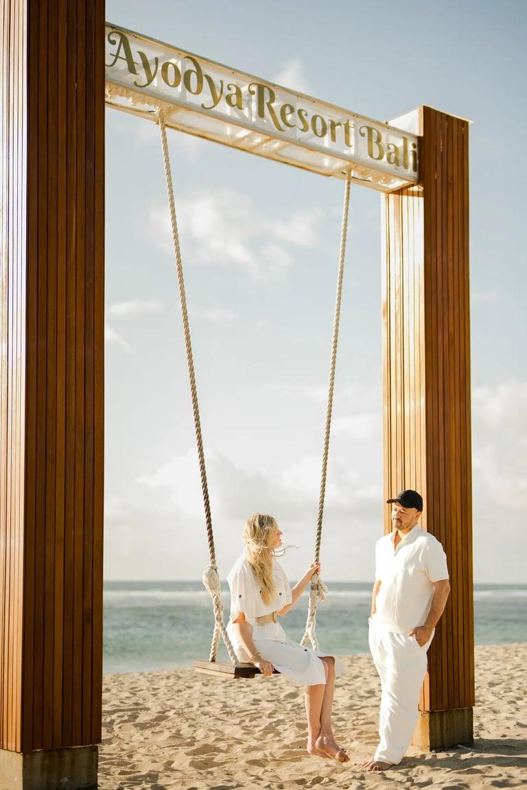 Family portrait near the iconic entrance gate of Ayodya Resort Bali in Nusa Dua