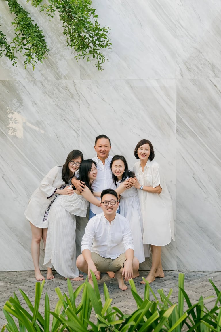 Stefy family portrait beside modern architecture at Renaissance Uluwatu Bali