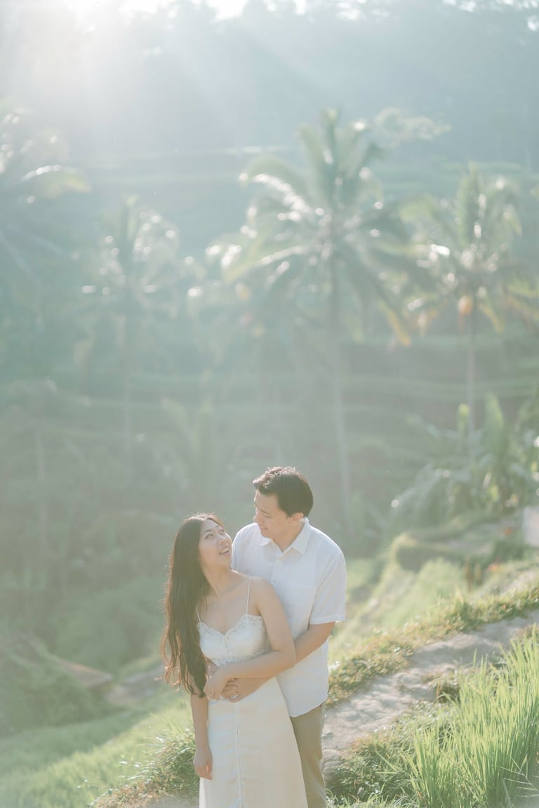 Intimate couple hug during a sunrise photography session at Tegalalang Ubud Bali.