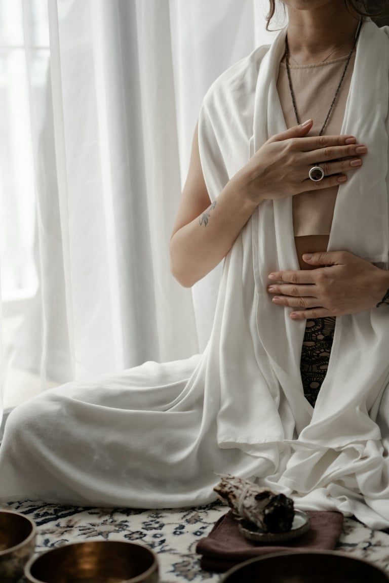 a woman sitting in ceremony
