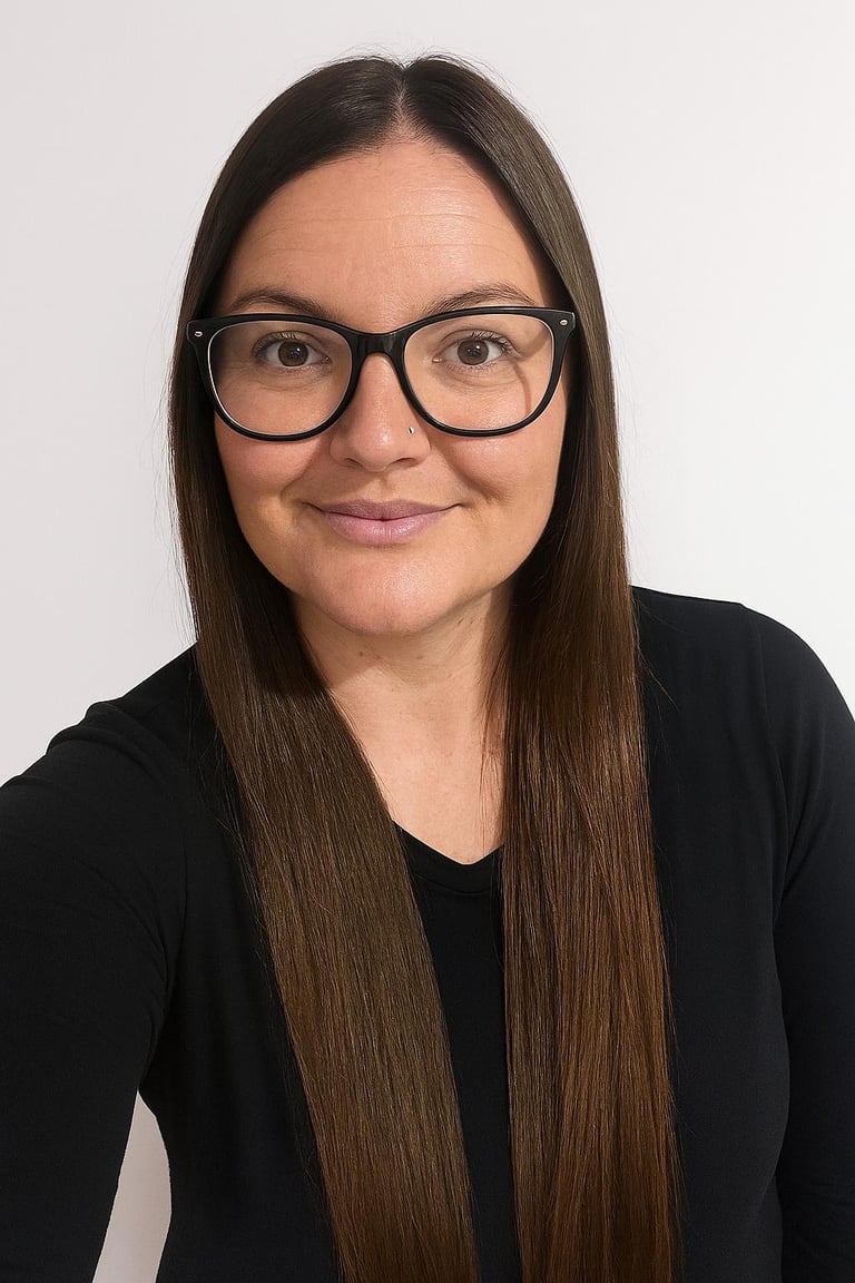 a woman with glasses and a black top