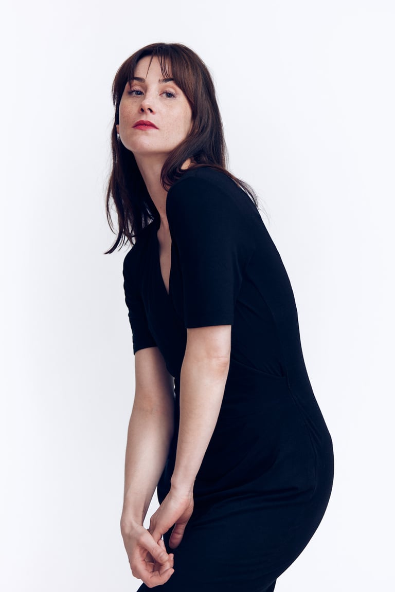 Woman looking bored looking upward.