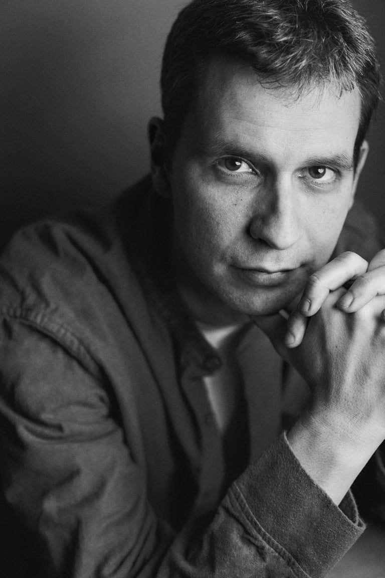 Black and white headshot of Álvaro Del Olmo.