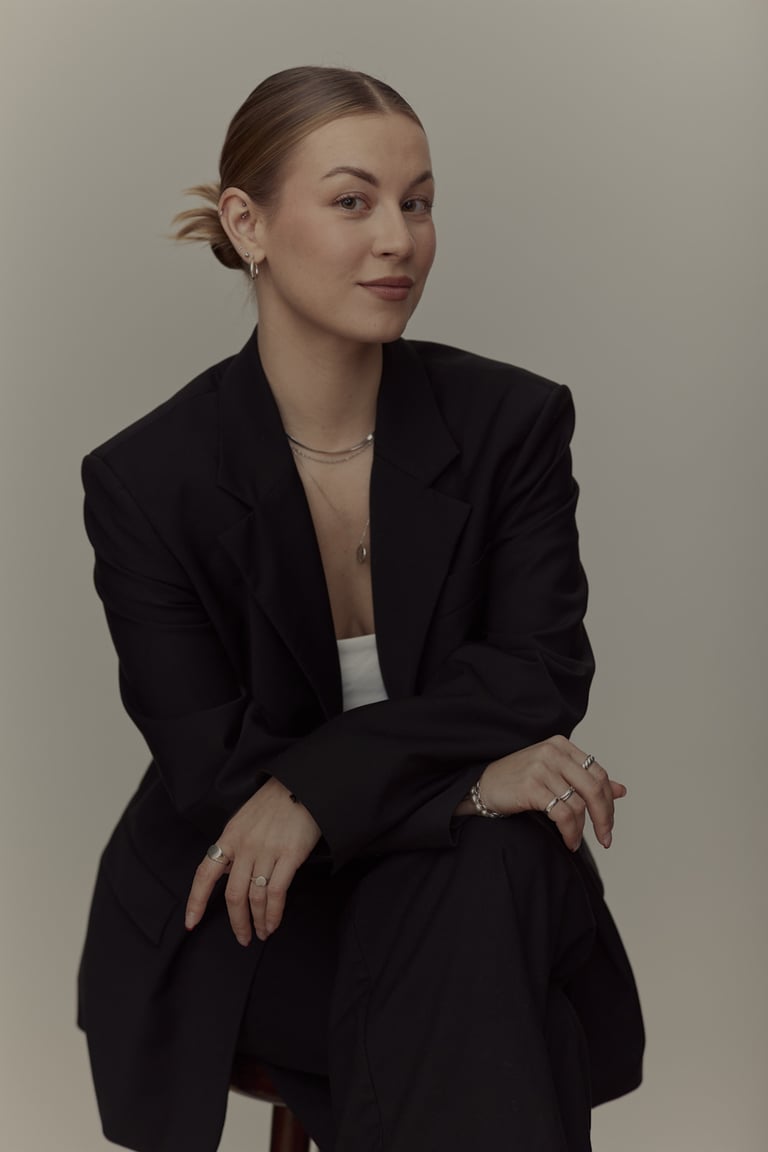 A moody studio business portrait.