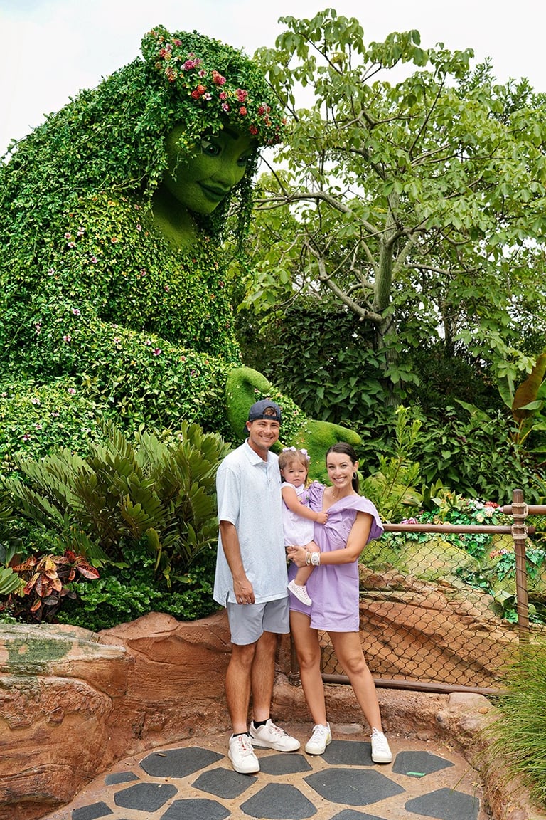 Jessica Henderson pictured with her family at Journey of Water inside EPCOT® at Walt Disney World®.