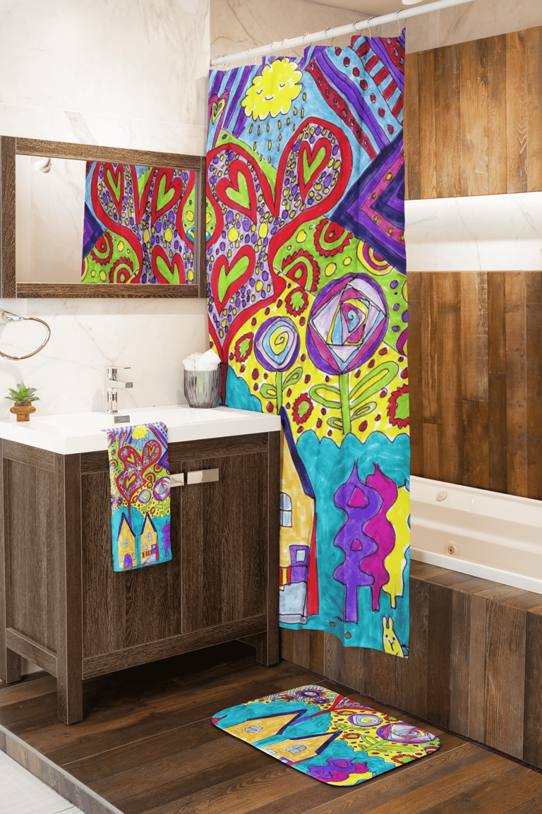 Image of a shower curtain with matching towel and bath mat in a bathroom 