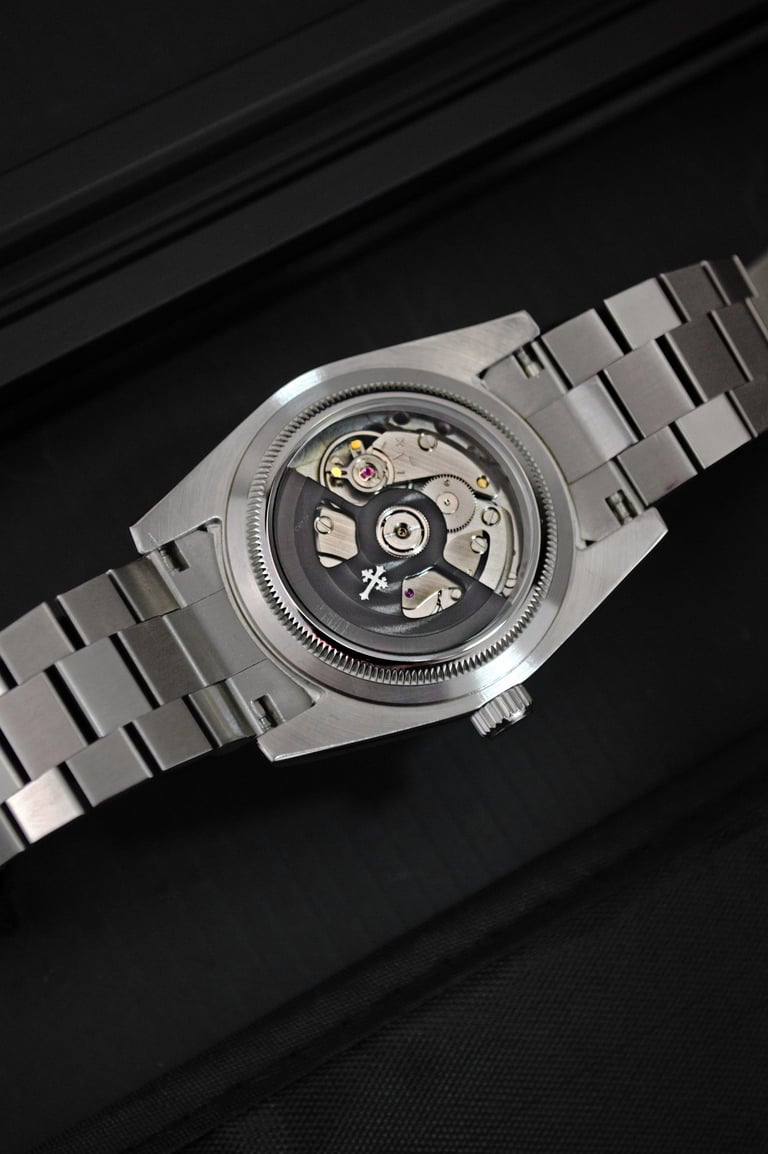 a watch with a metal bracelet