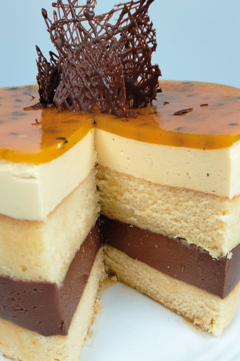 a cake with a chocolate layer of cake and chocolate frosting