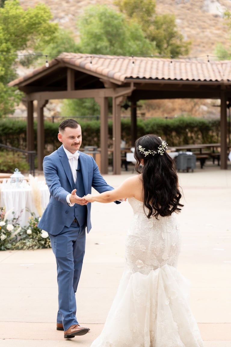 a bride and groom dancing at a wedding