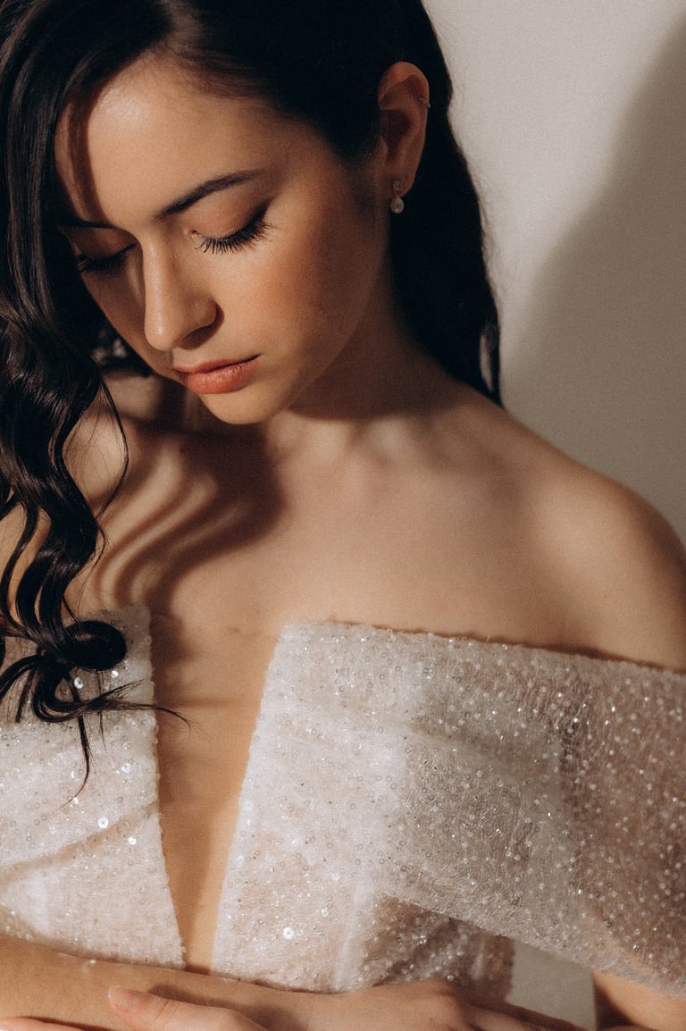 a woman in a white dress with a white dress