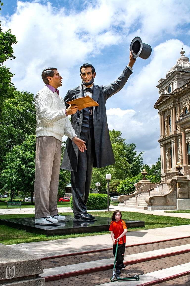 Photo of A. Lincoln and boy on scooter