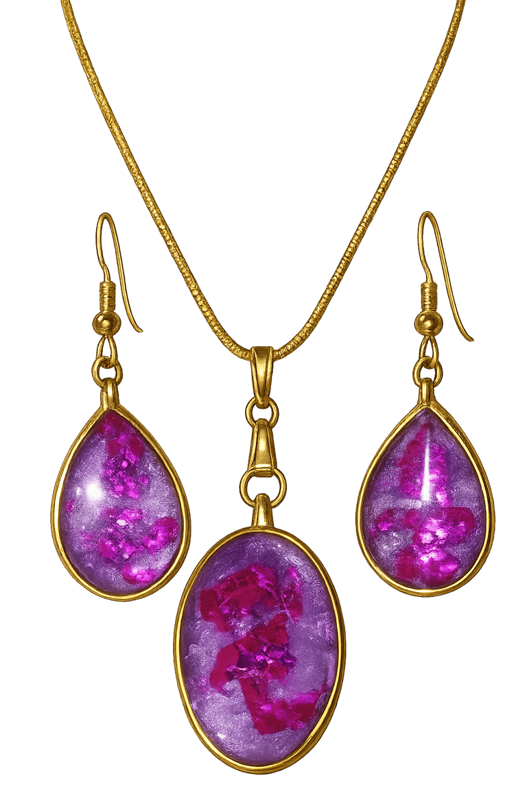 a necklace with a purple marbled pendant and a gold necklace