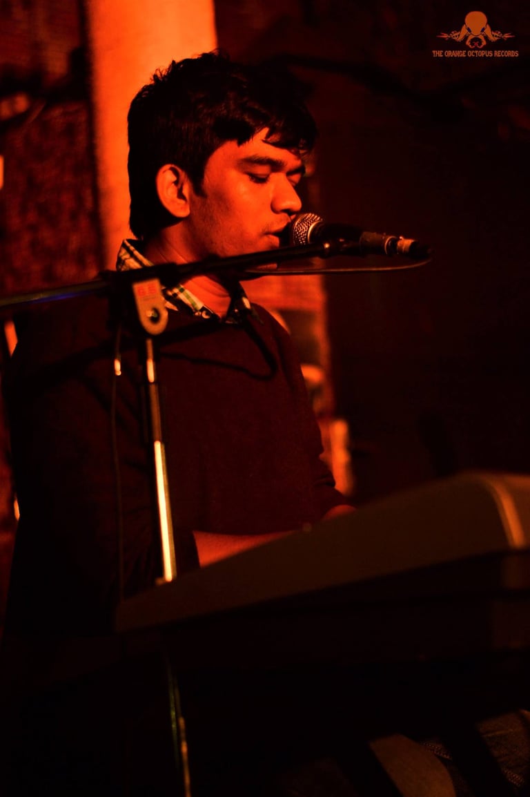 Piyush Bhisekar, a singer-songwriter performs at an Orange Octopus event in 2017.
