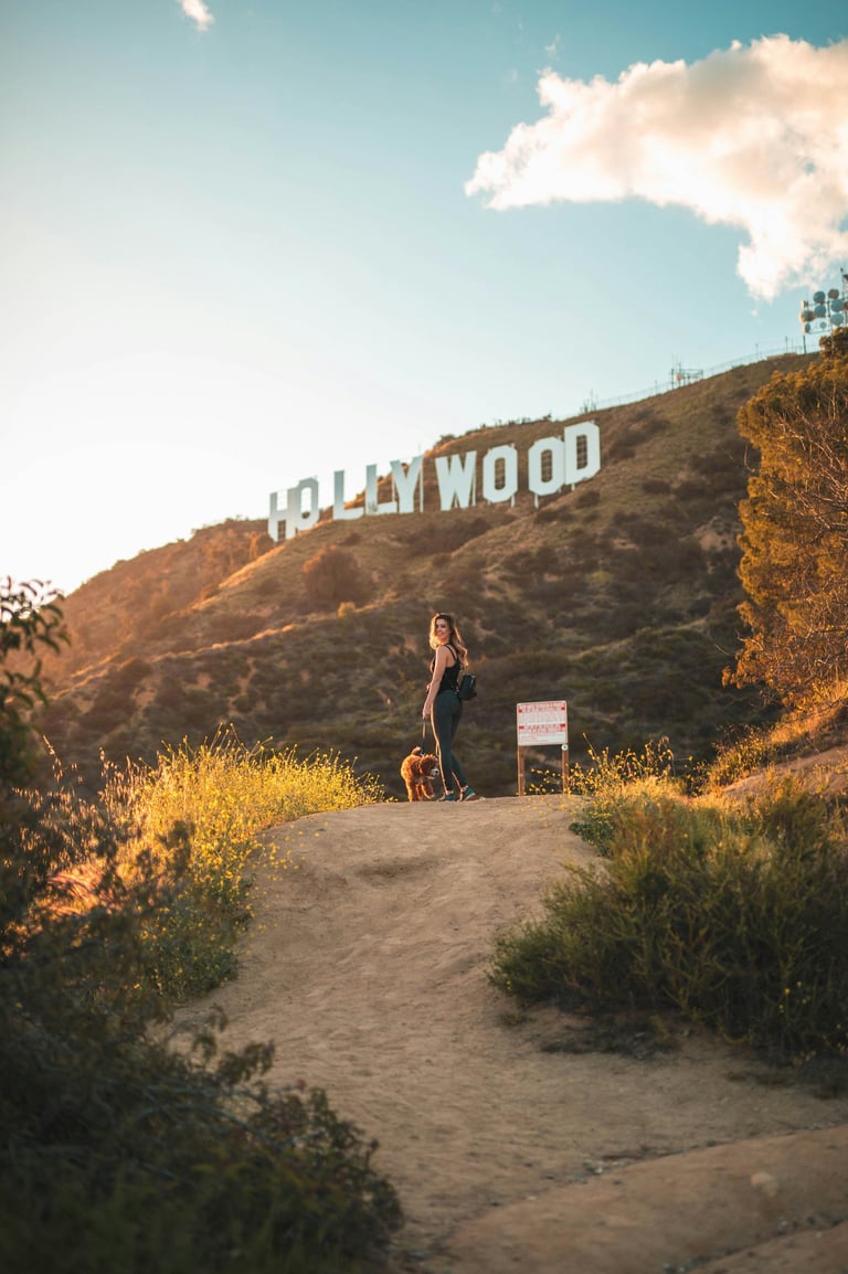 woman-with-dog-hollywood-sign-hike