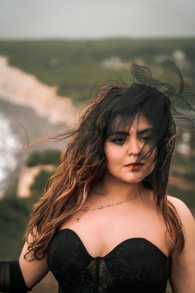 Woman in black dress posing outdoors – creative portrait photography in Kent by Fred Art Studio