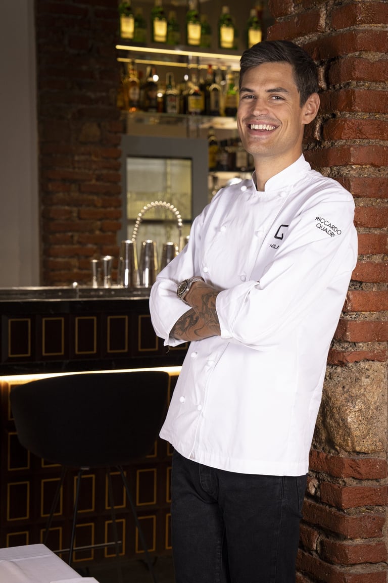 Ritratto dello chef e patron Riccardo Quadri all'interno del suo bistrot milanese.