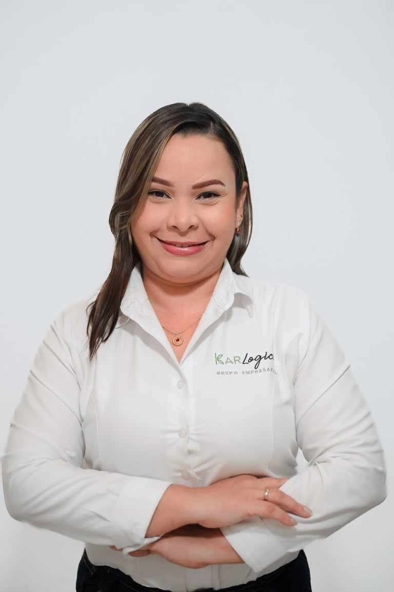 a woman in a white shirt and black pants