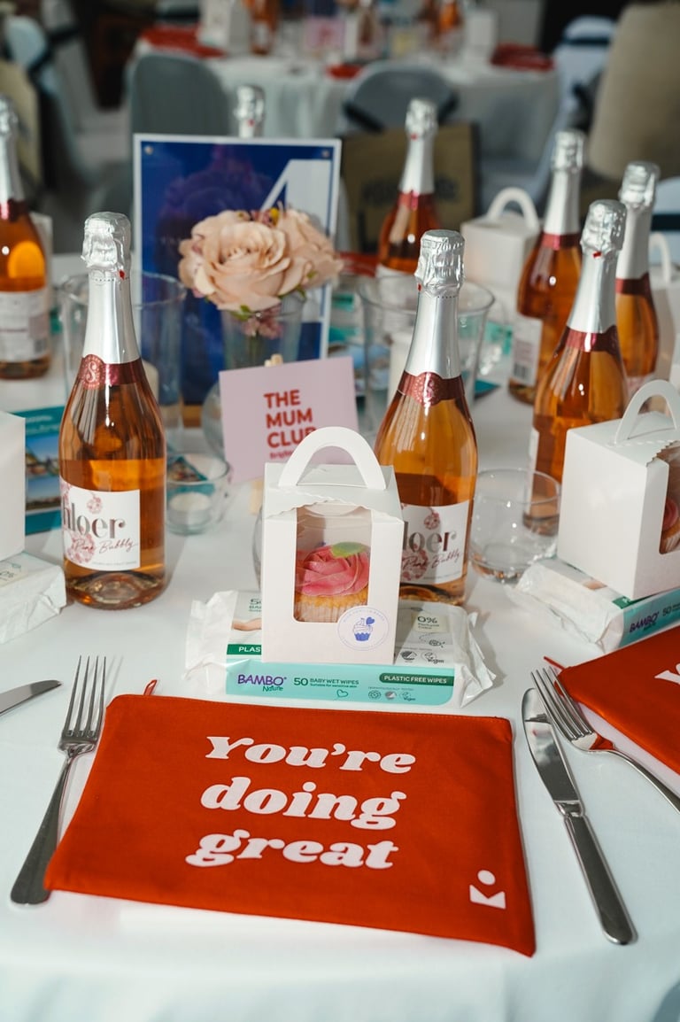 Champagne bottles and gift boxes at a professional event photoshoot in Brighton