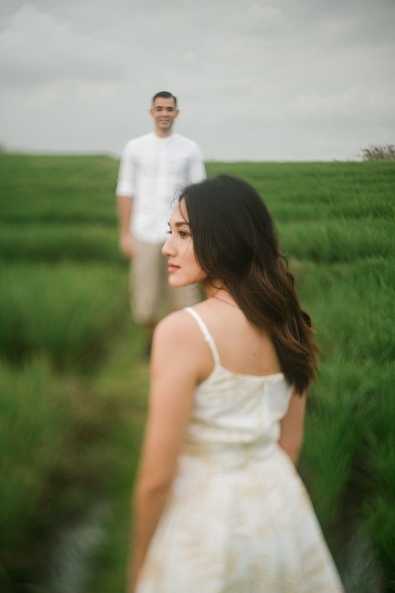 Bride turning in rice field during intimate couple session at Waka Gangga Tabanan Bali