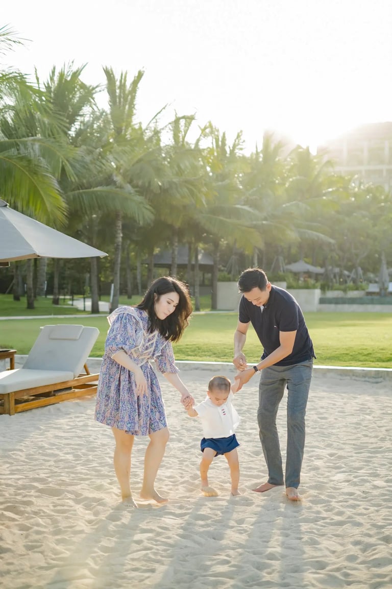 Lifestyle family photography on the beach at The Apurva Kempinski Bali