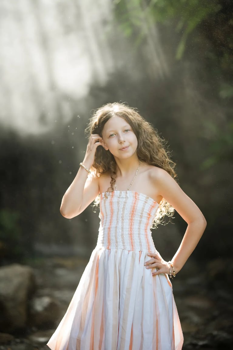 Daughter portrait during a family photography session at Umbul Sari Water Garden in Ubud Bali
