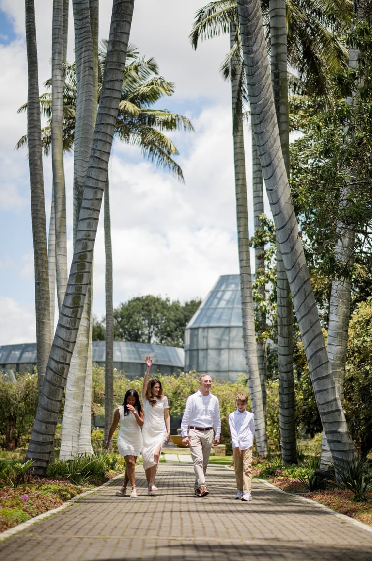 An international family walking together in Colombia, during their adoption journey.