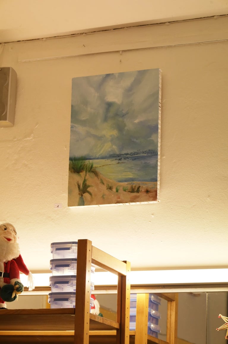 Impressionist oil painting of a coastal landscape with sand dunes and a cloudy sky.