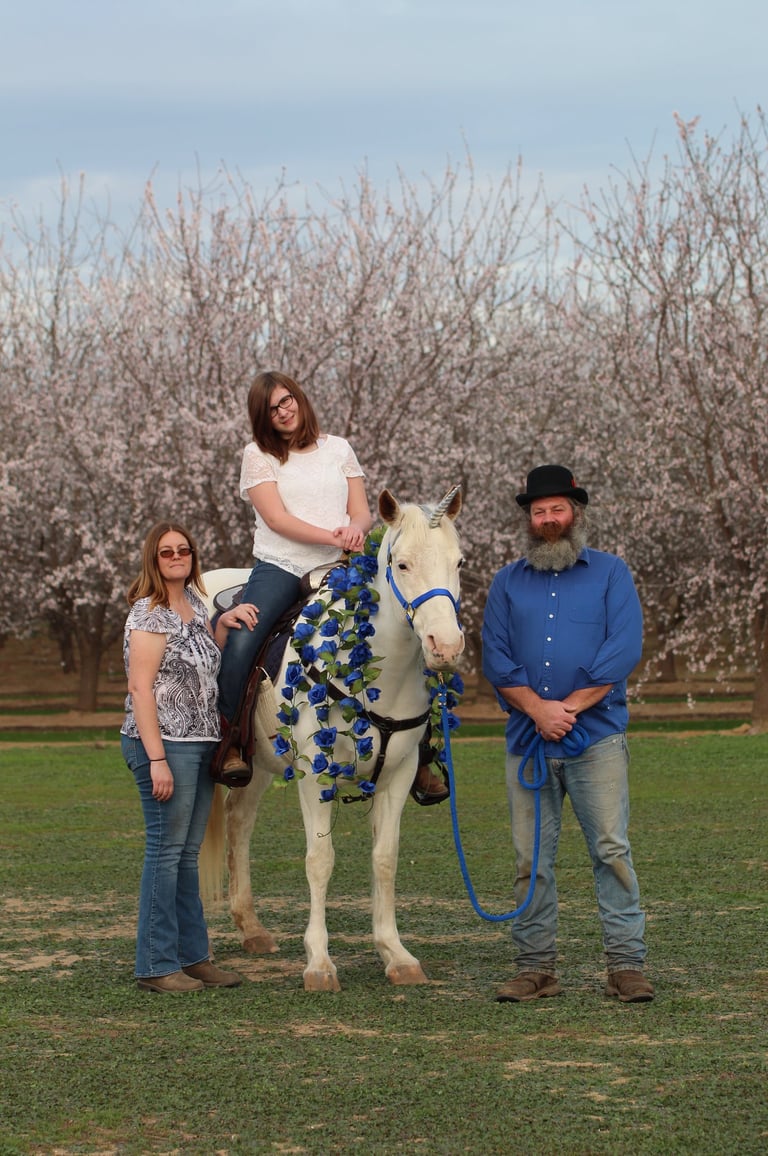The O'Hara Family Farm family with Aarya the unicorn