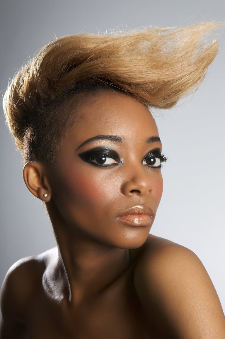 Woman displaying fashion makeup and hair