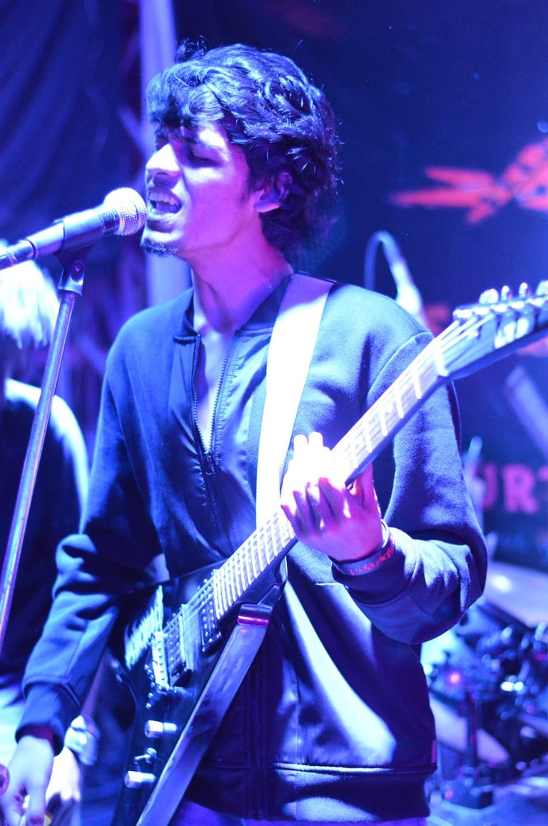 Rishikesh Dharap, a guitarist, performs with his band Ephemeral at an Orange Octopus event in 2016