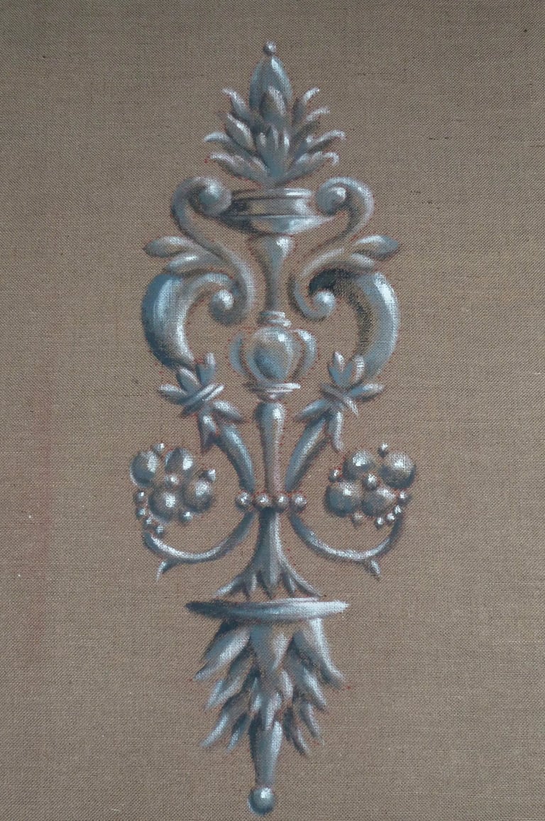 Ornementation théâtrale peinte sur une toile de jute pour le décor d'une pièce de théâtre.
