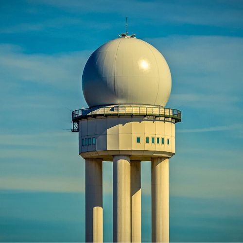 a large white dome shaped radar