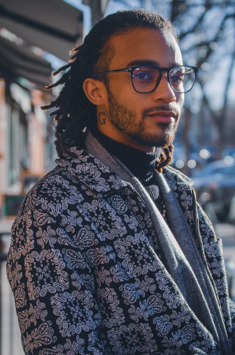 Man wearing classic black frames