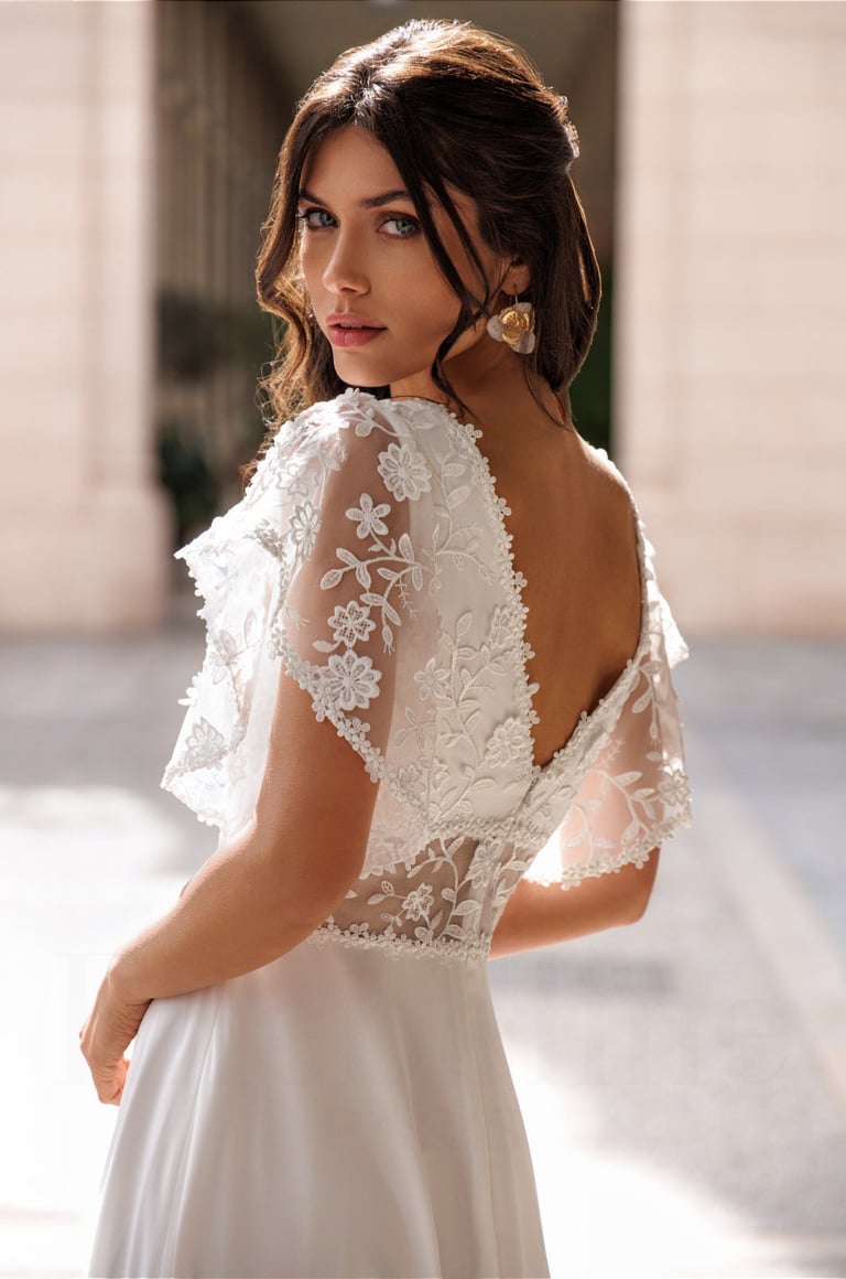 a woman in a white dress with a white dress