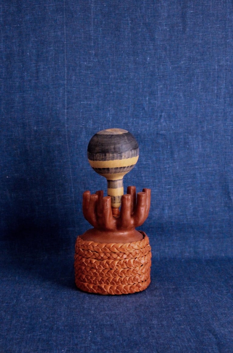 sculpture terre et cuir