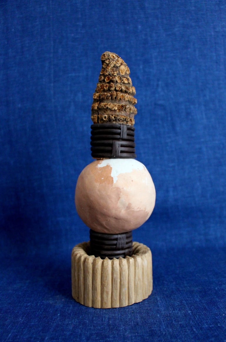 sculpture bois et terre