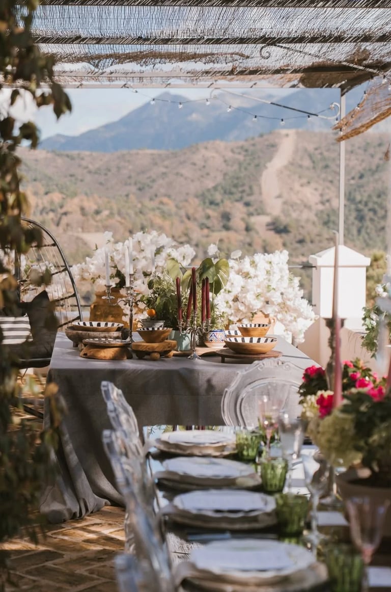 Al fresco dining table with countryside backdrop