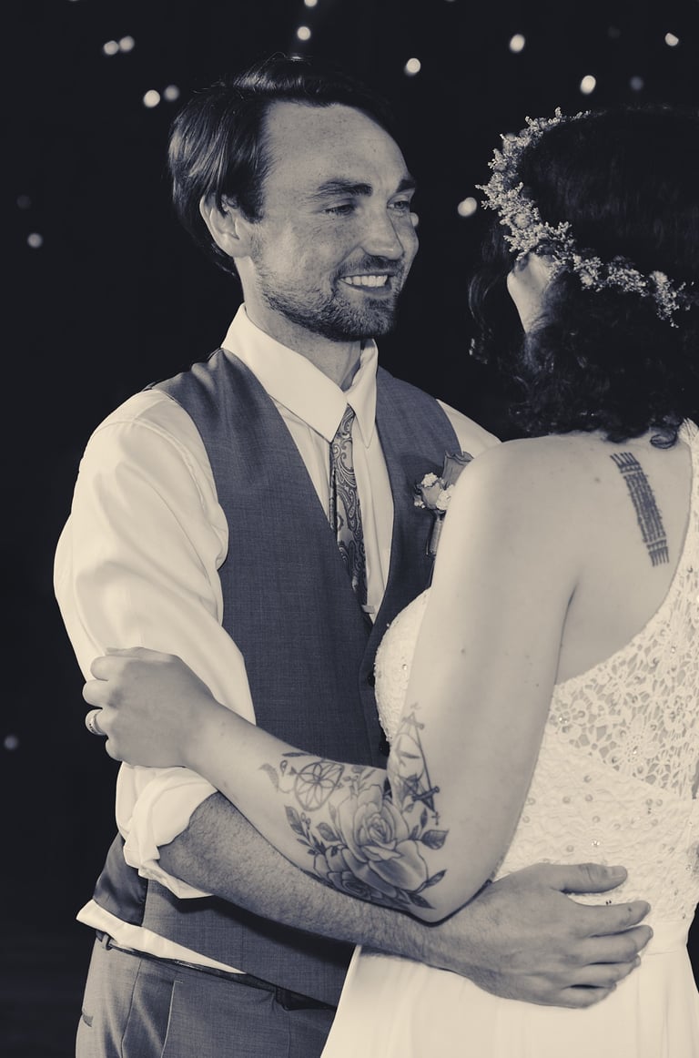 a bride and groom dancing at their wedding reception