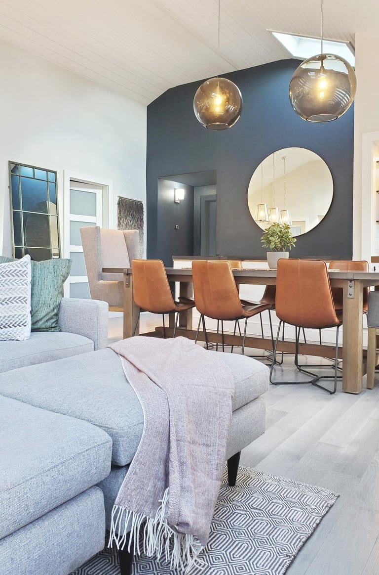 Open plan living dining, teal accent wall, globe pendants, cathedral ceiling, Medford MA, Erica Fossati Design
