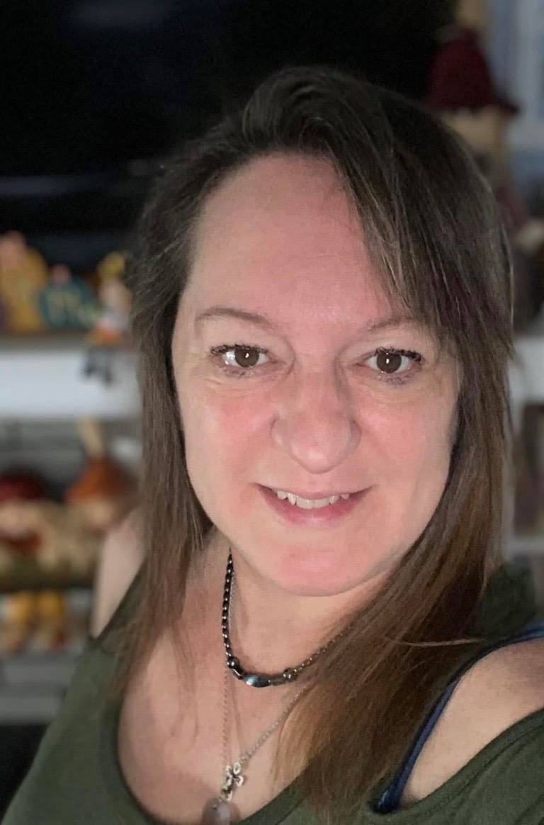 Cindy Hebert licensed massage therapist and wellness practitioner at Healing Compass WNY