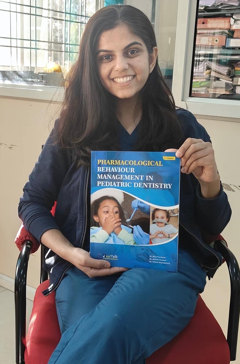 a woman in a wheelchair holding a book